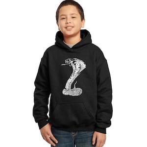 May include: Black hooded sweatshirt with a white graphic of a cobra made of words. The words include "cobra", "venom", "snake", and "black mamba".