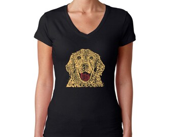 May include: Black v-neck t-shirt with a graphic of a golden retriever dog's head made of words related to dogs, such as "loyal", "best friend", "playful", and "obedient".
