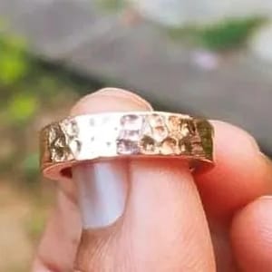 May include: A set of three ceramic mugs with a speckled, matte finish. The mugs are in shades of cream, light gray, and dark gray. Each mug has a simple, minimalist design, perfect for coffee or tea.