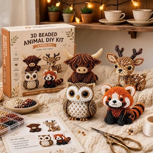 May include: A 3D beaded animal DIY kit featuring a box with illustrations of a highland cow, deer, owl, and red panda. The set includes loose beads in a bowl, a bead organiser, a needle, scissors, and four completed beaded animal figures.