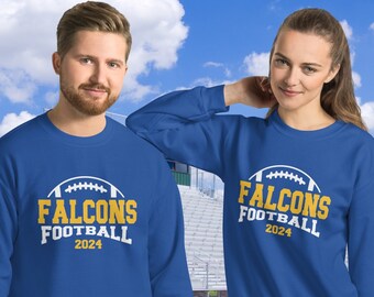 May include: Two royal blue sweatshirts with white text and a yellow football graphic. The text on the sweatshirts reads "Falcons Football 2024".