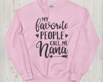 May include: Pink sweatshirt with the text "My favorite people call me Nana" in black lettering with a heart and arrow graphic.