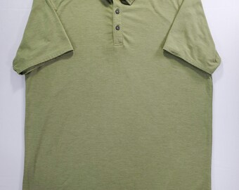 Polo Truewerk EDO Performance M color verde salvia, tejido elástico que absorbe la humedad.