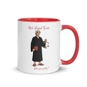 May include: White ceramic mug with a red interior and handle. The mug features an illustration of a judge holding scales and a book, with the text "Bot Penal Code" and "Are you guilty?"