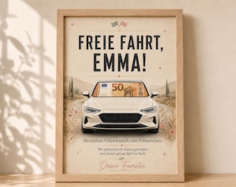 May include: A framed poster featuring a beige car on a winding road with a 50 Euro bill on the windshield. The text reads: FREIE FAHRT, EMMA! Herzlichen Glückwunsch zum Führerschein. Wir wünschen dir allzeit gute Fahrt und immer genug Sprit im Tank. Deine Familie.