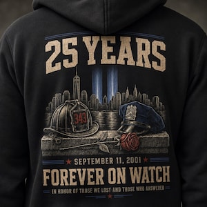 May include: A black hoodie featuring a graphic on the back with the text 25 YEARS, SEPTEMBER 11, 2001, FOREVER ON WATCH, IN HONOR OF THOSE WE LOST AND THOSE WHO ANSWERED. The design includes a New York City skyline, a firefighter helmet, a police cap, and a rose.