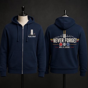 May include: A navy blue zip-up hoodie featuring a front graphic of the Twin Towers and the text NEVER FORGET SEPTEMBER 11, 2001. The back displays a skyline, the text NEVER FORGET, emergency service emblems, and the date 09.11.2001 in red, white, and blue.