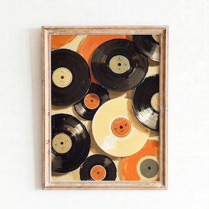 Puede incluir: Una obra de arte enmarcada con una colección de discos de vinilo en negro, crema y naranja. Los discos están dispuestos en una composición en capas, con un fondo claro y un marco de madera.