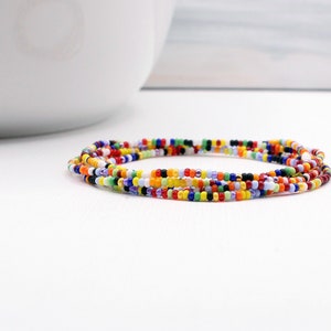 Bohemian beaded wrap bracelet can be worn as a 5x wrap bracelet, necklace or anklet. Vibrant rainbow color mix beads.