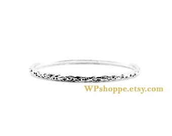 Dainty textured stacking ring, handmade using solid recycled sterling silver. Layering minimalist bands to stack or wear individually