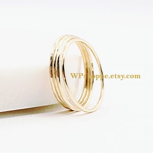 Hammered stacking band in gold filled. Minimalist hammered stacker ring sold individually or in sets.