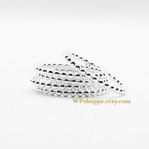 Silver beaded stacking ring solid individually or in sets. Minimalist stackable band.