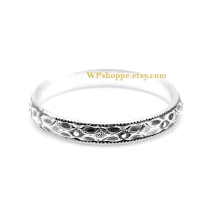 Art deco floral stacking ring. Solid sterling silver layering band. Textured starburst ring.