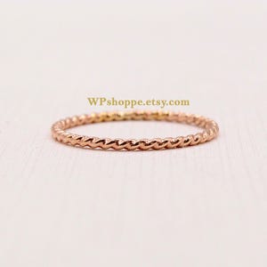 Thin rose gold filled twist stacking ring. Simple layering filler bands.