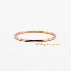Rose gold ultra thin stacking ring. Super Skinny, slender 14k rose gold fill band. Stackable and delicate, threadbare 1mm ring.