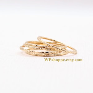 Delicate gold stacking ring. Minimalist textured gold filled ring. Simple hammered thin gold band. Handmade pitted stackable ring.