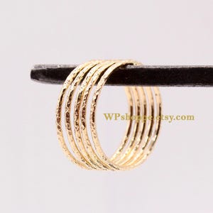 Gold filled stacker rings. Hand hammered pitted texture skinny stacking band. Minimalist ring stack.
