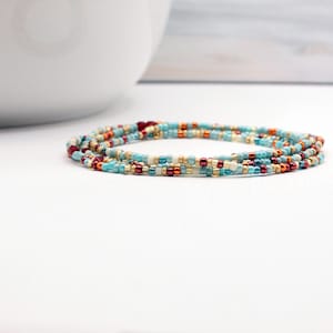 Bohemian multi wrap glass beaded bracelet. Friday Vibes strung beads and be worn as an anklet or necklace.