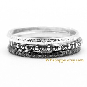 Delicate layering stacker ring in recycled sterling silver. Sold individually.