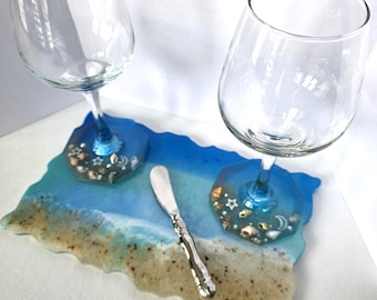 Beach-themed wine glass with attached coaster
