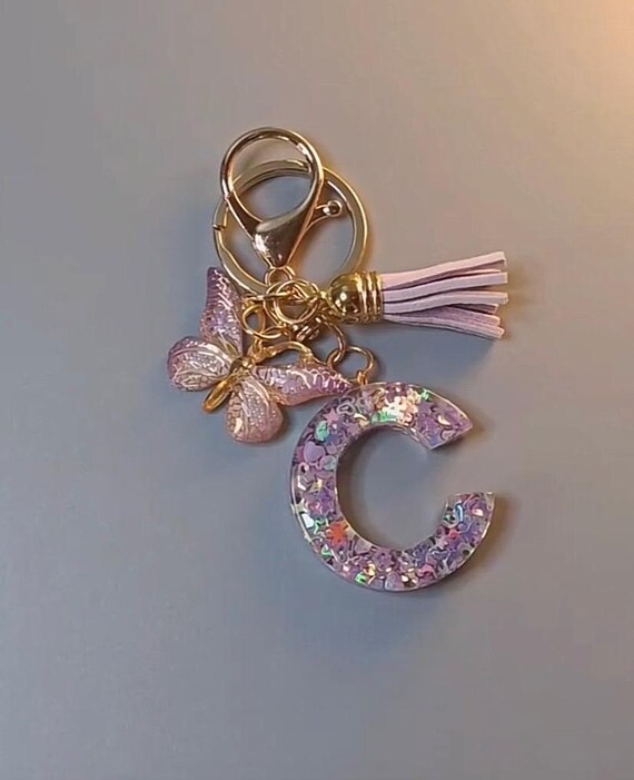 Any initial letter keychain with pink butterfly
