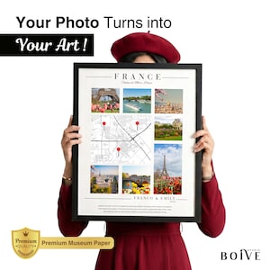 May include: A framed print featuring a map and images of Paris, France. The print includes the text "FRANCE" and "FRANCO & EMILY". The print is held by a person wearing a red beret and dress. The print is labeled "Premium Museum Paper".