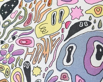 May include: Abstract textile design featuring colorful, organic shapes in shades of pink, yellow, blue, and green on a white background. The word "HOME" is integrated into the design. The artwork has a whimsical, cartoonish style.