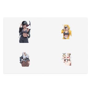 May include: A sticker sheet featuring four distinct anime-style character illustrations. The designs include a character in a black jacket, a character in a yellow hoodie, a character with white hair, and two characters wearing bunny-themed outfits.