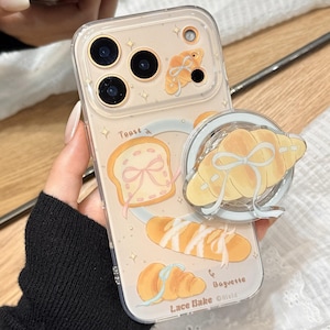 Cute Croissant Bread Magnetic Phone Case with Shaker PopSocket, Kawaii Bakery Phone Cover for iPhone 17 Pro Max, iPhone 16 15 Pro Max
