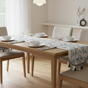 May include: A set of three ceramic mugs with a speckled, matte finish. Each mug features a different color: light blue, cream, and gray. The mugs have a simple, modern design and a comfortable handle.