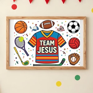 May include: A framed rectangular print featuring a central graphic of a colourful sports jersey with the text TEAM JESUS, surrounded by illustrations of a basketball, football, soccer ball, volleyball, tennis racket, golf club, and baseball glove.