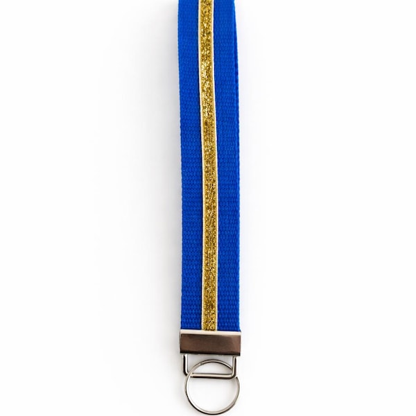Llavero de pulsera azul con purpurina dorada: correa para teléfono hecha a mano