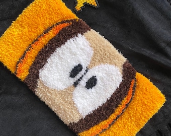 Alfombra Kenny South Park tejida a mano