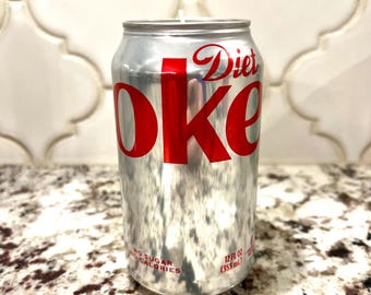 Vela feita com lata reciclada de Coca-Cola Diet