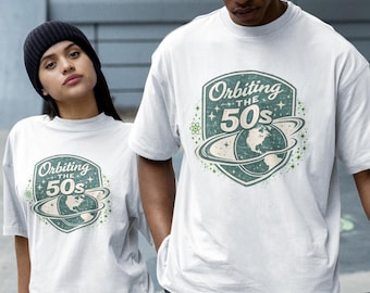 レトロなミッドセンチュリーモダンスタイルのスペースエイジTシャツ、50年代のアトミックグラフィックTシャツ