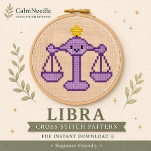 May include: A cross stitch pattern in a wooden hoop featuring a purple Libra scale icon with a yellow star on top. The text reads CalmNeedle Cross Stitch Patterns, LIBRA, Cross Stitch Pattern, PDF Instant Download, and Beginner Friendly.