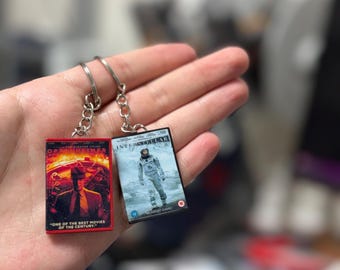Interstellar & Oppenheimer DVD Schlüsselanhänger