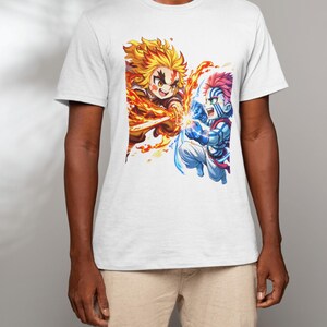 May include: White t-shirt featuring a colorful graphic of two anime characters engaged in battle. One character is surrounded by flames, the other by ice. The artwork is detailed and vibrant, with dynamic poses.