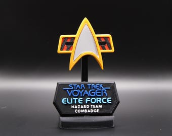 Insignia magnética con clip de la Fuerza Élite de Star Trek Voyager con soporte de exhibición