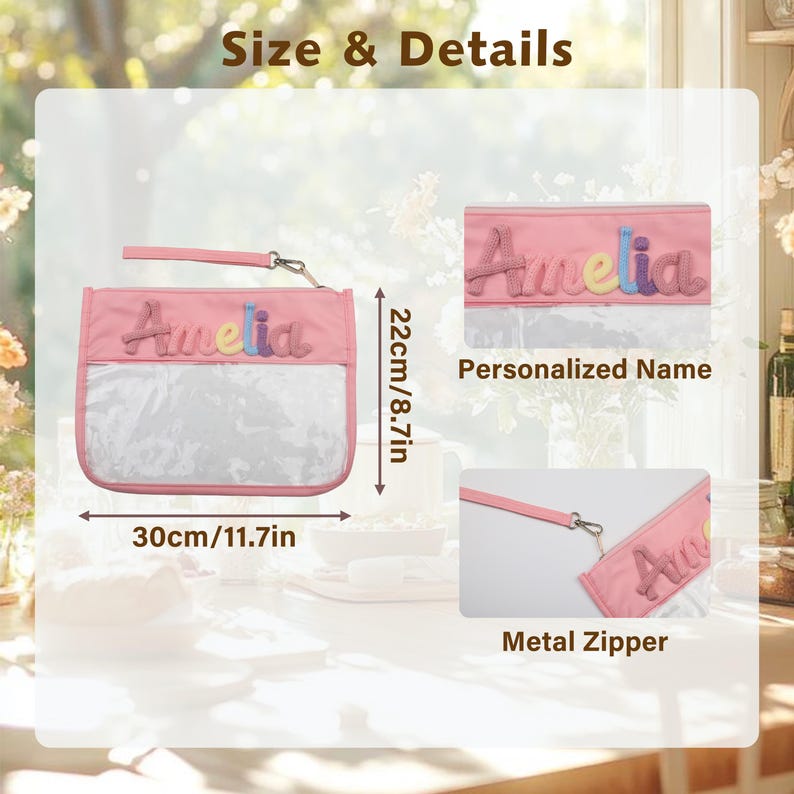 May include: A pink rectangular pouch with a clear front panel and a wrist strap. The name Amelia is appliqued in multi-colored letters. Dimensions are 11.7 inches by 8.7 inches. The pouch features a metal zipper and personalized name detailing.