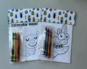 May include: Two activity sheets with a caterpillar maze and a bug illustration, each topped with a colorful beetle-patterned header. Each sheet is packaged in a clear plastic sleeve with three Crayola crayons attached to the front of the paper.