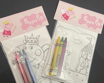 May include: Two Peppa Pig themed coloring activity sets in clear plastic packaging. Each set includes a white paper sheet with black line art and three Crayola crayons. The header cards are pink with Peppa Pig text and a fairy princess graphic.