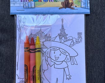 May include: A clear plastic package containing a coloring book and three crayons. The coloring book features the word "Madeline" and an illustration of a girl in a yellow hat and a dog. The crayons are orange, red, and yellow.