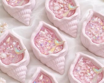 Vela de concha rosa de regalo