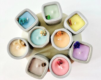 Set di candele pastello in barattolo di cemento