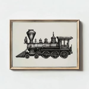 May include: Black and white illustration of a vintage steam train, framed in a light wood. The detailed drawing shows the engine's boiler, smokestack, and wheels. The train is set against a neutral background, creating a classic, nostalgic feel.