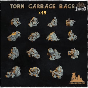 May include: A set of 15 grey miniature resin figures depicting torn garbage bags with various debris, including bottles and cans. The text TORN GARBAGE BAGS x15 and ZABAVKA WORK & SHOP is visible. The items are pre-supported for tabletop gaming.