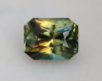 Natural Parti Sapphire Radiant Cut 1.12 CT – Green Sapphire, Bi Color
