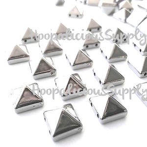 100pc 10mm Sew On Pyramid Studs. High End Supplies for DIY Crafts. T-shirts. Shoes. Jackets. Costumes. Based in the USA.5 Star Buyer Reviews