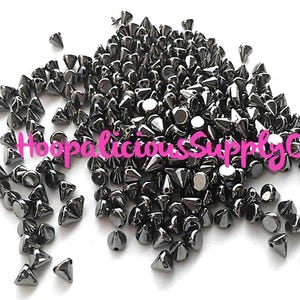 100pc 6mm Morsel Cone Studs. Tiny. Sew or Glue on. Craft Supplies. DIY. T-shirts. Shoes. Jackets. Costumes. We’re in the USA. 5 Star Reviews image 2
